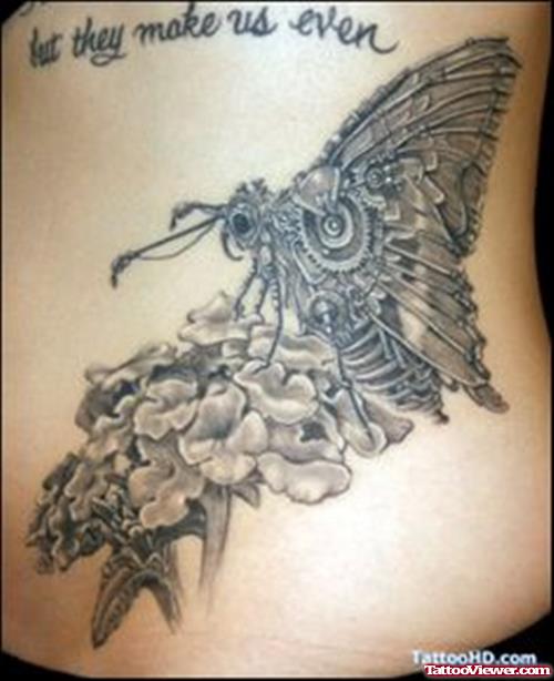 Grey Ink Flowers And Moth Fantasy Tattoo On Side Rib