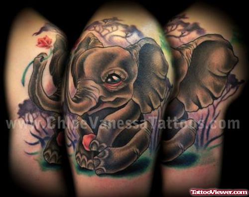 Grey Ink Elephant Fantasy Tattoo On Shoulder