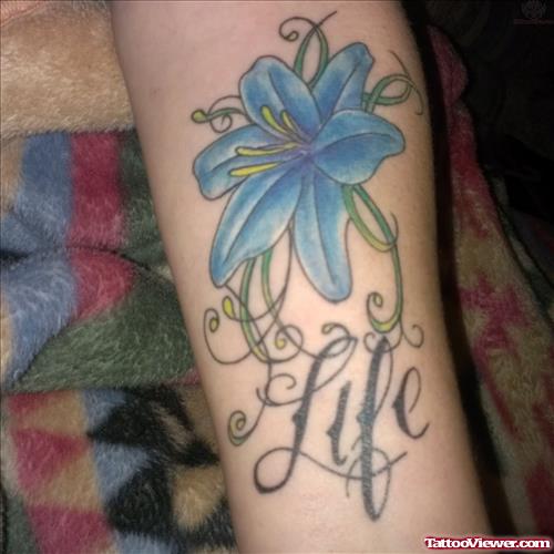 Blue Lily Flower Fantasy Tattoo On Sleeve