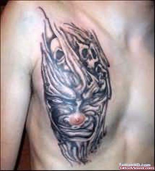 Devil Face Tattoo On Chest