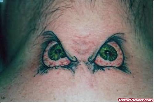 Big Eyes Fantasy Tattoo On Neck
