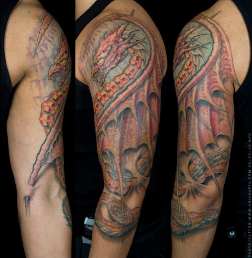 Awesome Colored Dragon Fantasy Tattoo On Sleeve