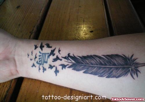 Flying Birds In Feather Tattoo On Forearm