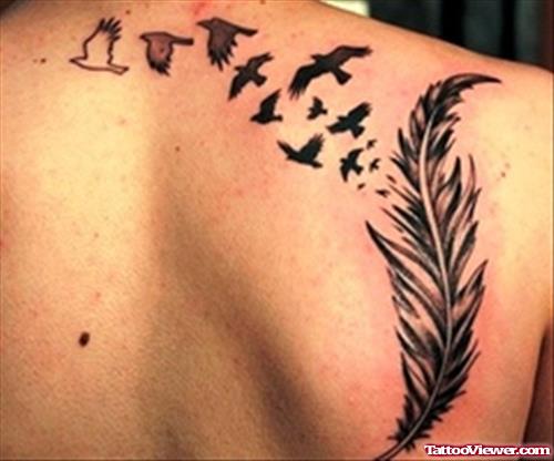 Feather And Flying Birds Tattoo On Back