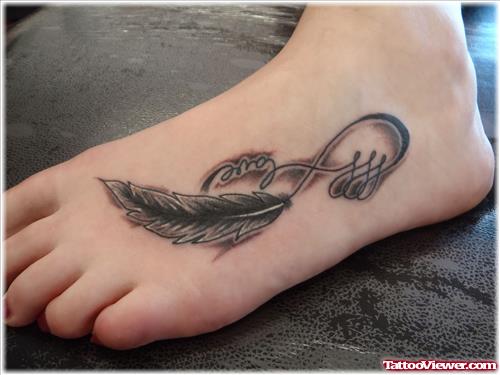Feather And Infinty Symbol Tattoo On Left Foot
