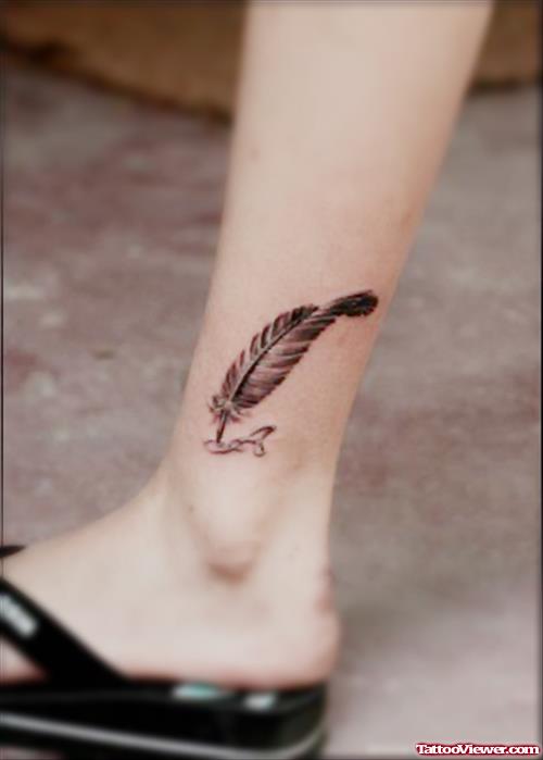Girl Left Ankle Feather Tattoo