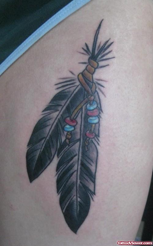 Awesome Grey Ink Feather Tattoos