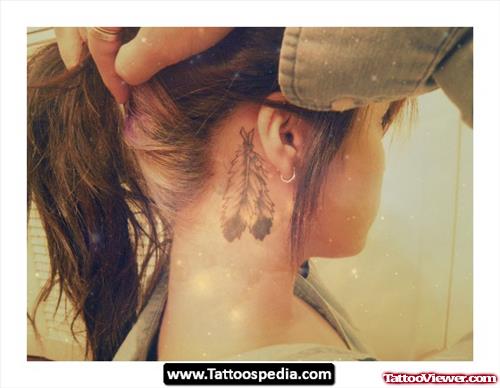 Feather Tattoo Below The Ear