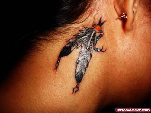 Grey Ink Indian Feather Tattoo On Side Neck