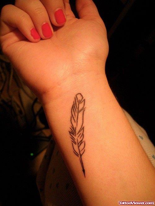 Girl Wrist Feather Tattoo