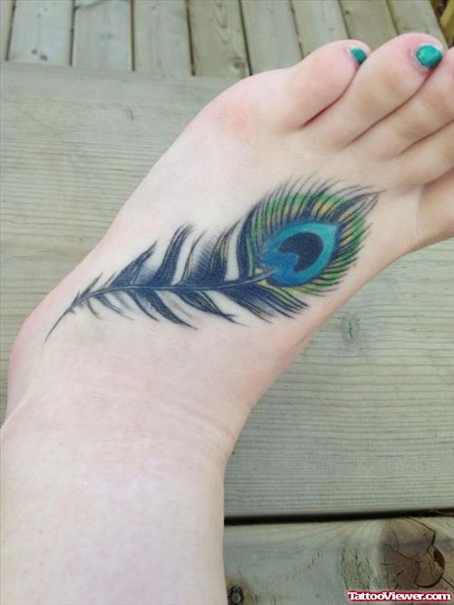 Colored Peacock Feather Tattoo On Left Foot