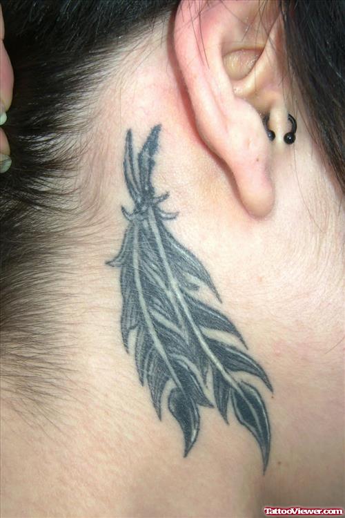 Black Ink Feather Tattoos Behind Ear