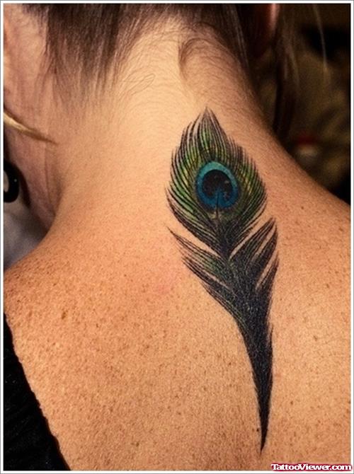 Attractive Peacock Feather Tattoo On Upperback