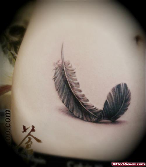 Amazing Feather Tattoo On Hip
