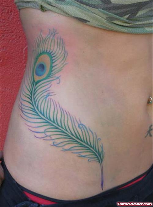 Green Ink Peacock Feather Tattoo On Girl Rib Side