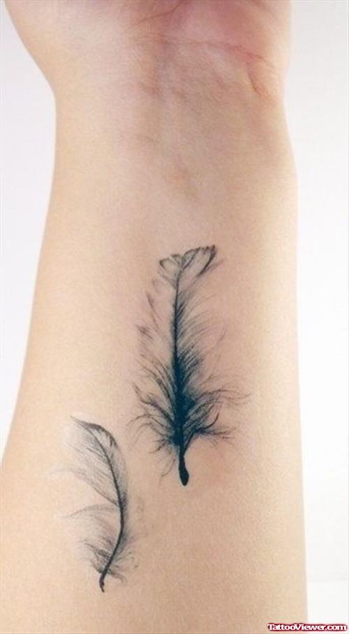 Feathers Tattoos on Wrists