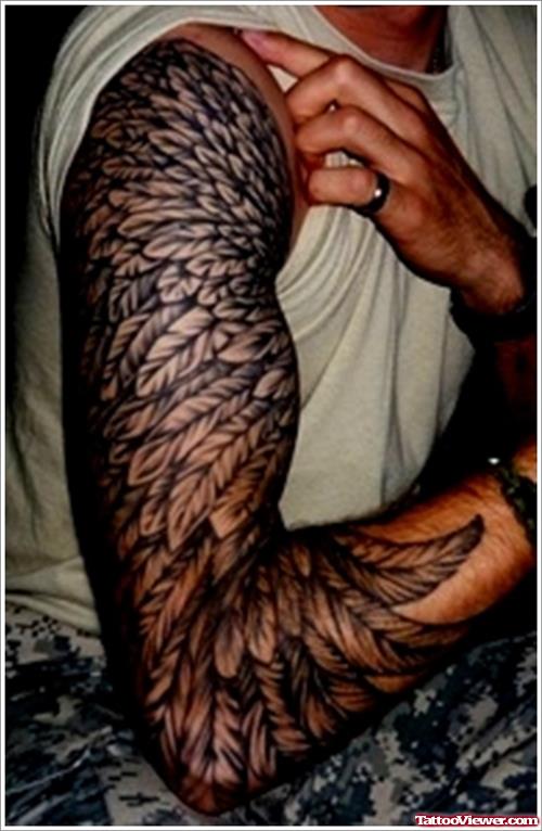 Feather Tattoo On Right Sleeve