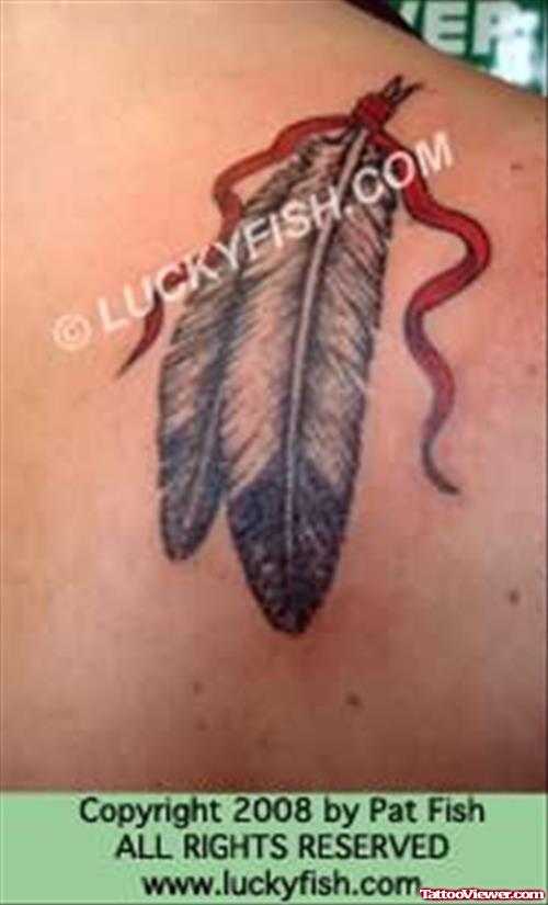 Eagle Feather Tattoo On Back