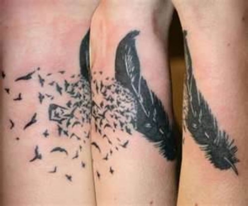Flying Birds And Feather Tattoo On Biceps