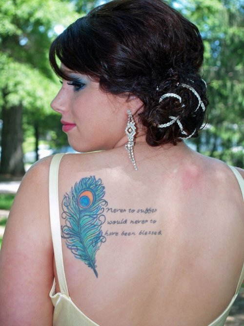 Script And Peacock Feather Tattoo On Back