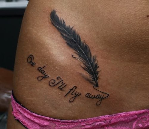 One Day IвЂ™ll Fly Away Feather Tattoo On Hip