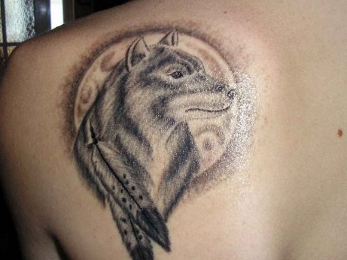 Moon With Wolf Head And Feathers Tattoos On Back Shoulder