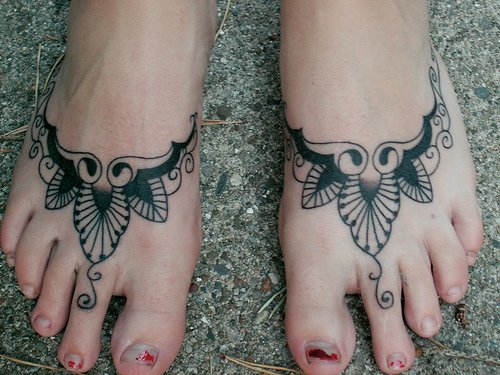 Grey Ink Tattoo On Feet