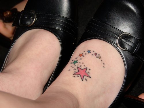 Colored Stars Feet Tattoo For Girls
