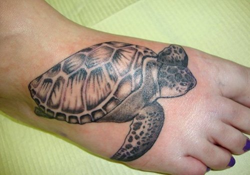 Grey Ink Sea Turtle Tattoo On Foot