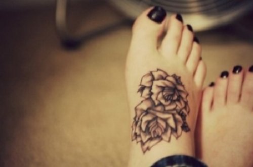 Grey Flowers Feet Tattoo For Girls