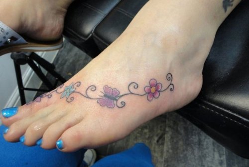 Butterflies and Flowers Tattoo On Foot