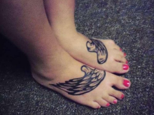 Grey Ink Angel Wings Tattoo On Foot