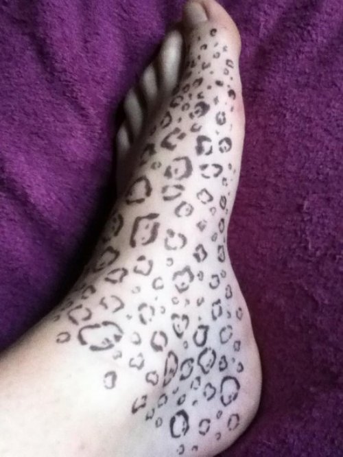 Amazing Leopard Print Feet Tattoo