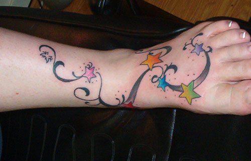 Wonderful Colored stars Feet Tattoo