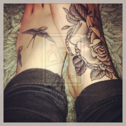 Grey Ink Flower And Flying Bird Feet Tattoo