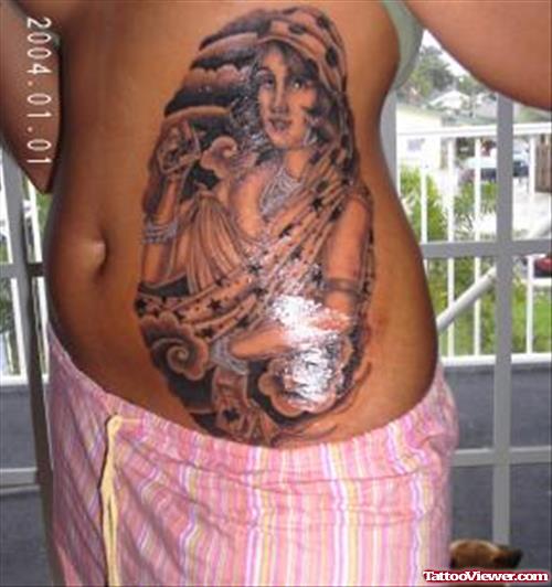 Grey Ink Feminine Tattoo On Girl Rib Side