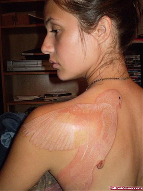 White Ink Flying Dove Feminine Tattoo On Back Shoulder