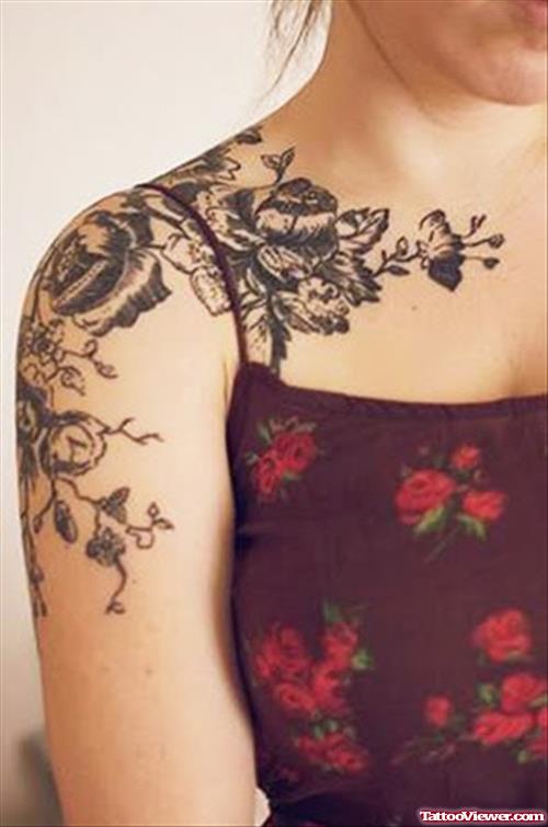 Grey Ink Flowers Feminine Tattoo On Shoulder