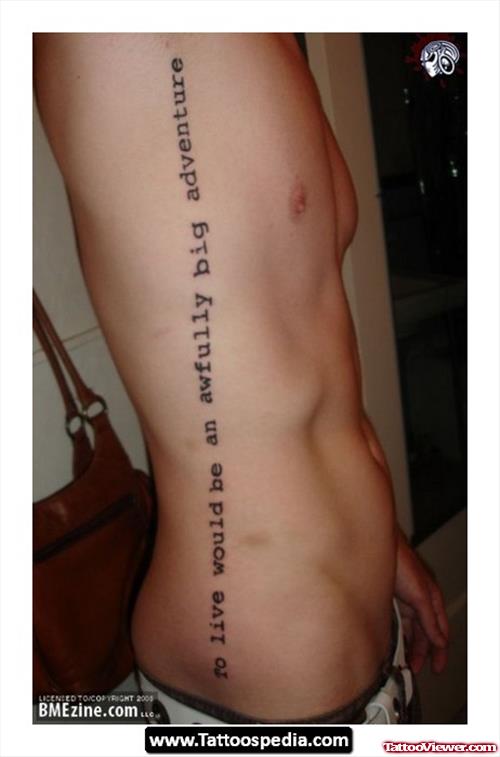 Man With Feminine Tattoo On Side