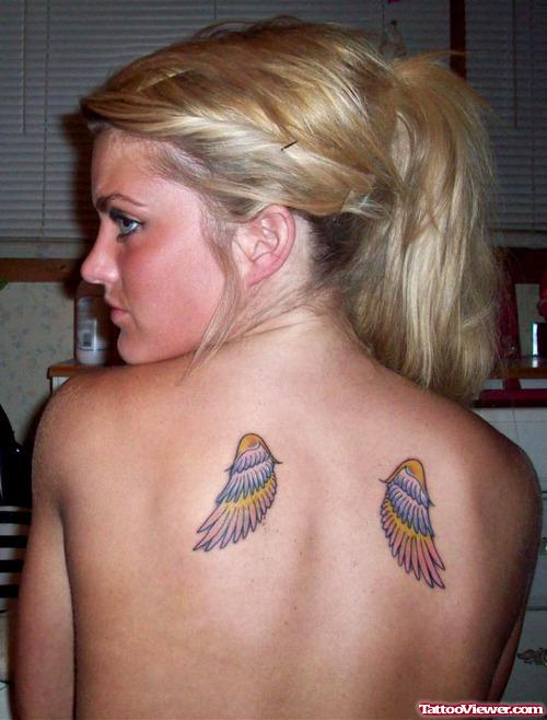 Feminine Wings Tattoos On Back