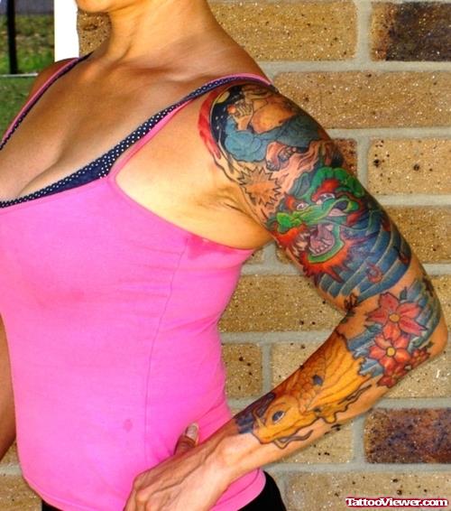 Girl With Colored Feminine Tattoo On Left Sleeve