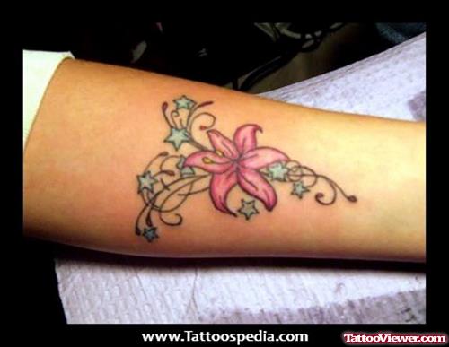 Stars And Lily Flower Feminine Tattoo On Leg