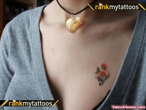 Flowers And Butterfly Feminine Tattoo On Chest