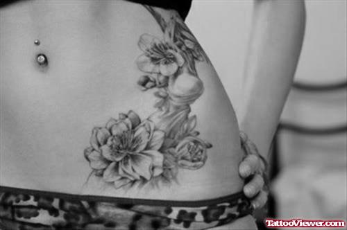 Feminine Flowers Tattoo On Hip