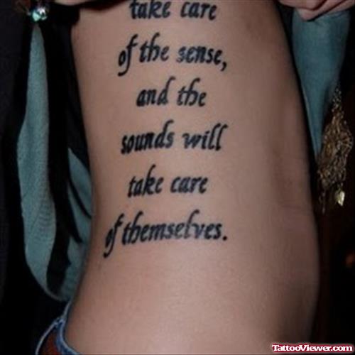 Feminine Quote Tattoo On Side Rib