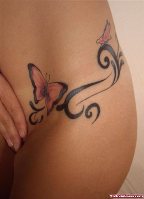 Butterfly And Tribal Feminine Tattoo On Side
