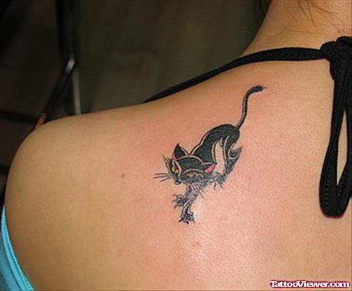 Black Ink Cat Feminine Tattoo On Back Shoulder
