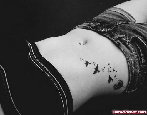 Dandelion Puff and Flying Birds Feminine Tattoo On Side Rib
