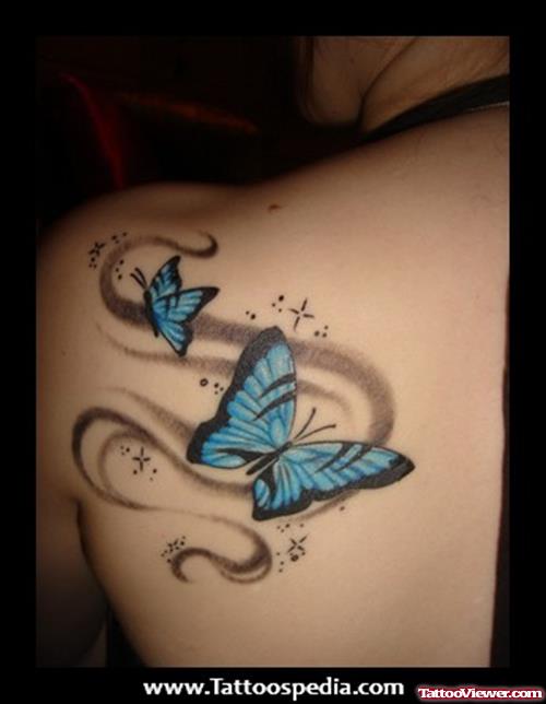 Blue Ink Butterflies Feminine Tattoo On Back Shoulder