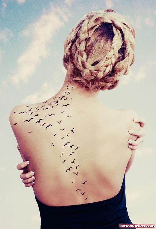 Feminie flying Birds Tattoo